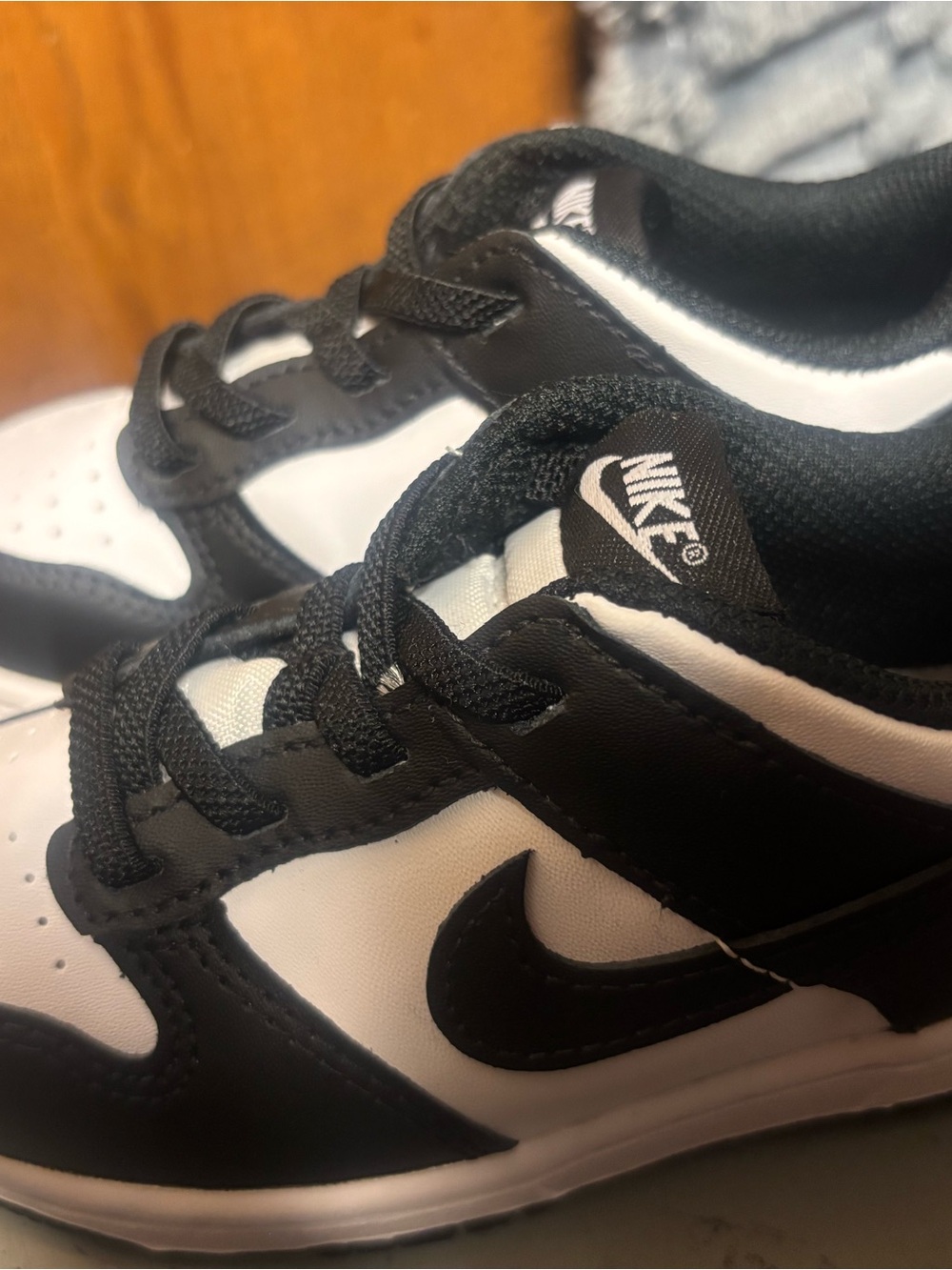 Nike Kids Black and White Low Top Sneakers with Swoosh